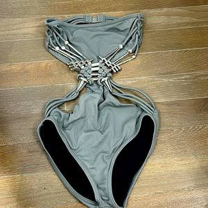 Never used vintage Gucci one piece bathing suit in size XS.